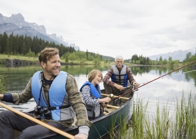 three generations in a canoe fishing