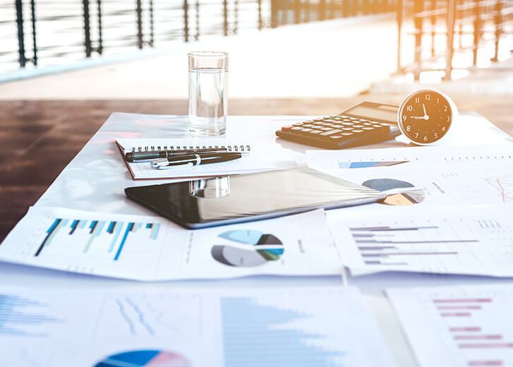 Business office equipment on the business paper. Report chart